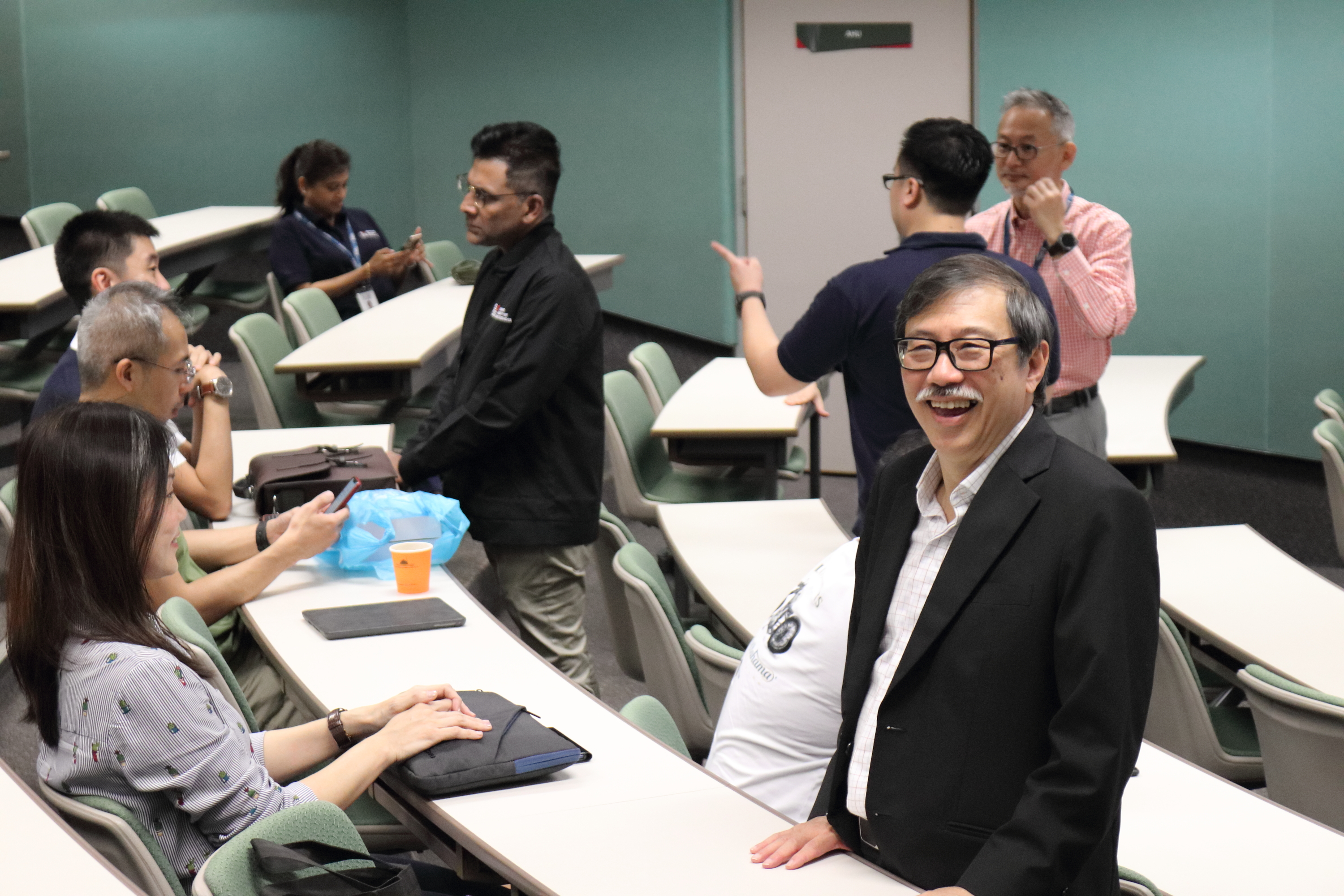 Prof Chew sharing a candid moment with his students at SUSS. (Credit: Prof Leslie Chew)